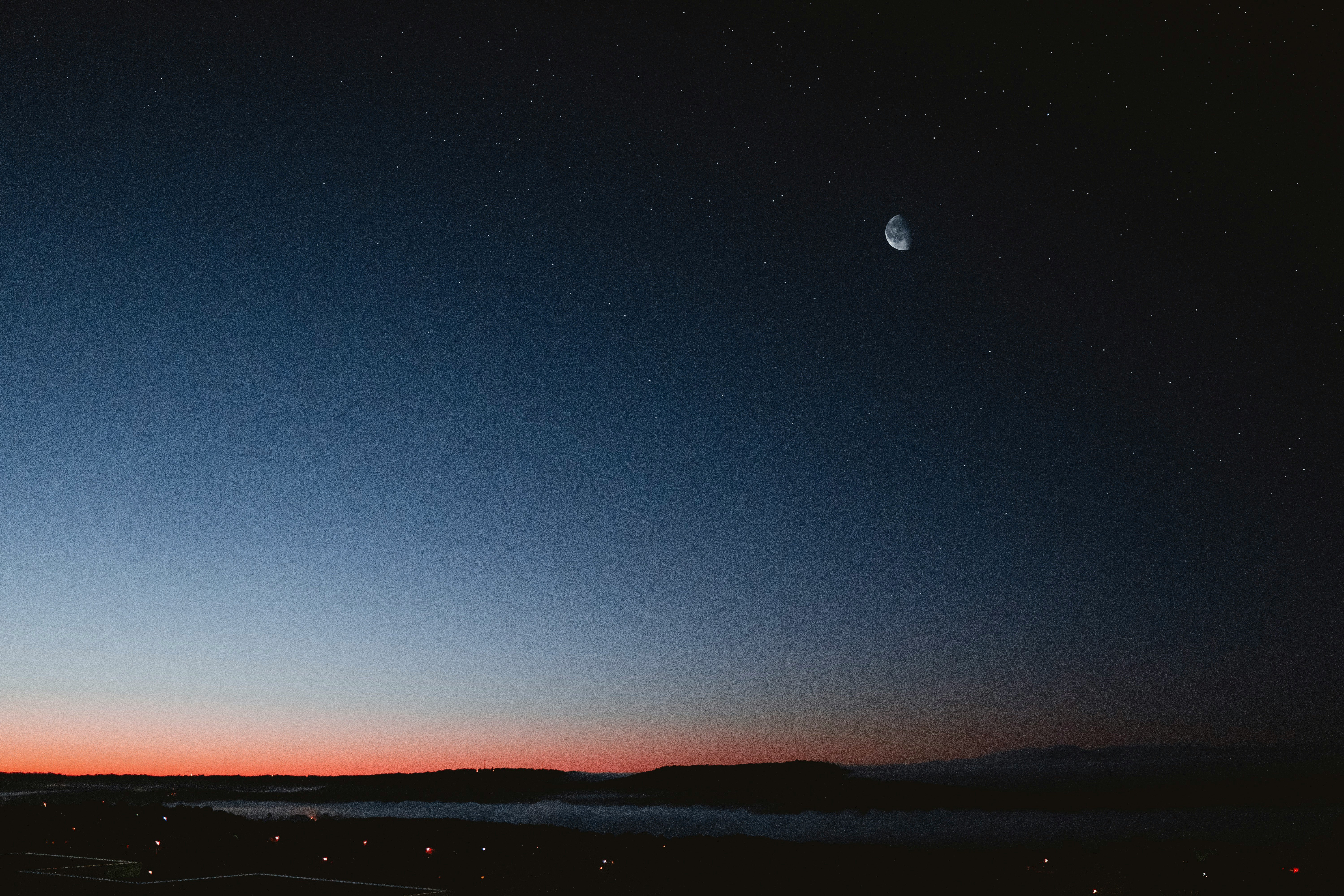 silhouette photography of buildings during dawn